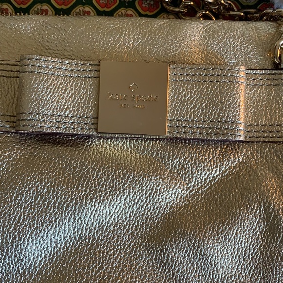Kate spade gold metallic bow purse. Never used. Retail 298 - Picture 2 of 6